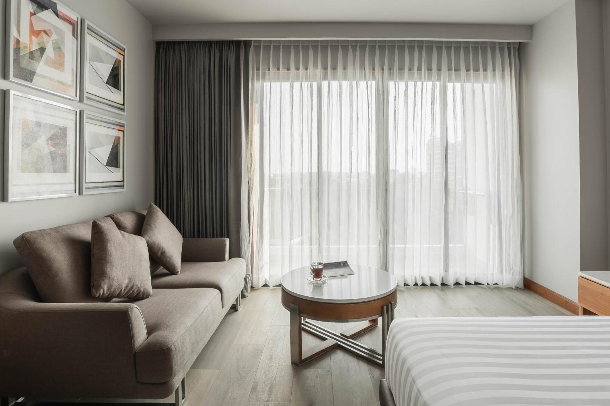 Sn Residences Вьентьян Номер фото